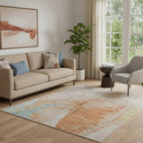 5' X 8' Peach Orange And Teal Abstract Washable Area Rug With UV Protection