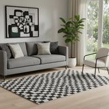 5' X 8' Black And Ivory Geometric Washable Area Rug With UV Protection
