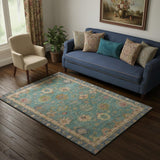 5' X 8' Teal And Blush Oriental Washable Area Rug With UV Protection
