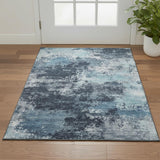 3' X 5' Blue And Ivory Abstract Washable Area Rug With UV Protection