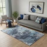 5' X 8' Blue And Ivory Abstract Washable Area Rug With UV Protection