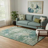 5' X 8' Teal And Beige Abstract Washable Area Rug With UV Protection