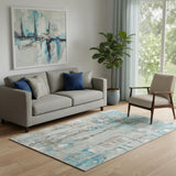 5' X 8' Teal And Ivory Abstract Washable Area Rug With UV Protection