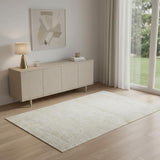 4' X 5' Cream And Gold Abstract Area Rug
