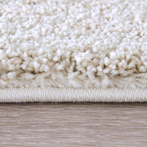 5' X 8' Charcoal Brown And Ivory Floral Distressed Area Rug With Fringe