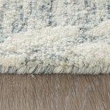 5' X 8' Blue Gray And Ivory Abstract Distressed Stain Resistant Area Rug