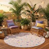 8' Pink And Ivory Round Geometric Washable Indoor Outdoor Area Rug