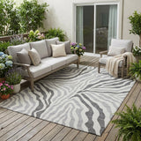 5' X 8' Gray And Ivory Zebra Print Washable Indoor Outdoor Area Rug