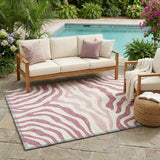 5' X 8' Pink And Ivory Zebra Print Washable Indoor Outdoor Area Rug
