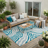 5' X 8' Teal Blue And Ivory Zebra Print Washable Indoor Outdoor Area Rug