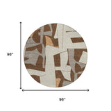 8' Brown And Beige Round Geometric Washable Indoor Outdoor Area Rug