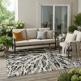5' X 8' Black And Ivory Abstract Washable Indoor Outdoor Area Rug