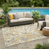 5' X 8' Gold And Ivory Abstract Washable Indoor Outdoor Area Rug
