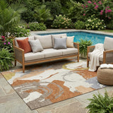 5' X 8' Orange And Beige Abstract Washable Indoor Outdoor Area Rug