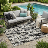 5' X 8' Black And Taupe Abstract Washable Indoor Outdoor Area Rug