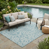 5' X 8' Teal Blue And Ivory Geometric Washable Indoor Outdoor Area Rug