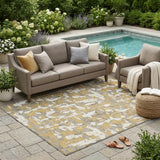 5' X 8' Gold And Ivory Abstract Washable Indoor Outdoor Area Rug