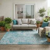 5' X 8' Teal Blue And Brown Oriental Washable Indoor Outdoor Area Rug