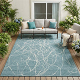 5' X 8' Teal Blue And Ivory Abstract Washable Indoor Outdoor Area Rug