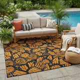 5' X 8' Orange And Black Animal Print Washable Indoor Outdoor Area Rug