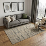 5' X 8' Tan And Silver Abstract Hand Woven Area Rug