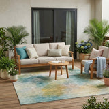 5' X 8' Teal Blue And Peach Abstract Washable Indoor Outdoor Area Rug