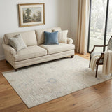5' X 8' Beige And Ivory Abstract Area Rug
