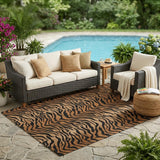 5' X 8' Rust And Orange Animal Print Washable Indoor Outdoor Area Rug