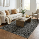 5' X 8' Black And Gray Animal Print Shag Washable Area Rug With UV Protection