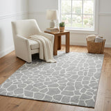 5' X 8' Gray And White Animal Print Shag Washable Area Rug With UV Protection